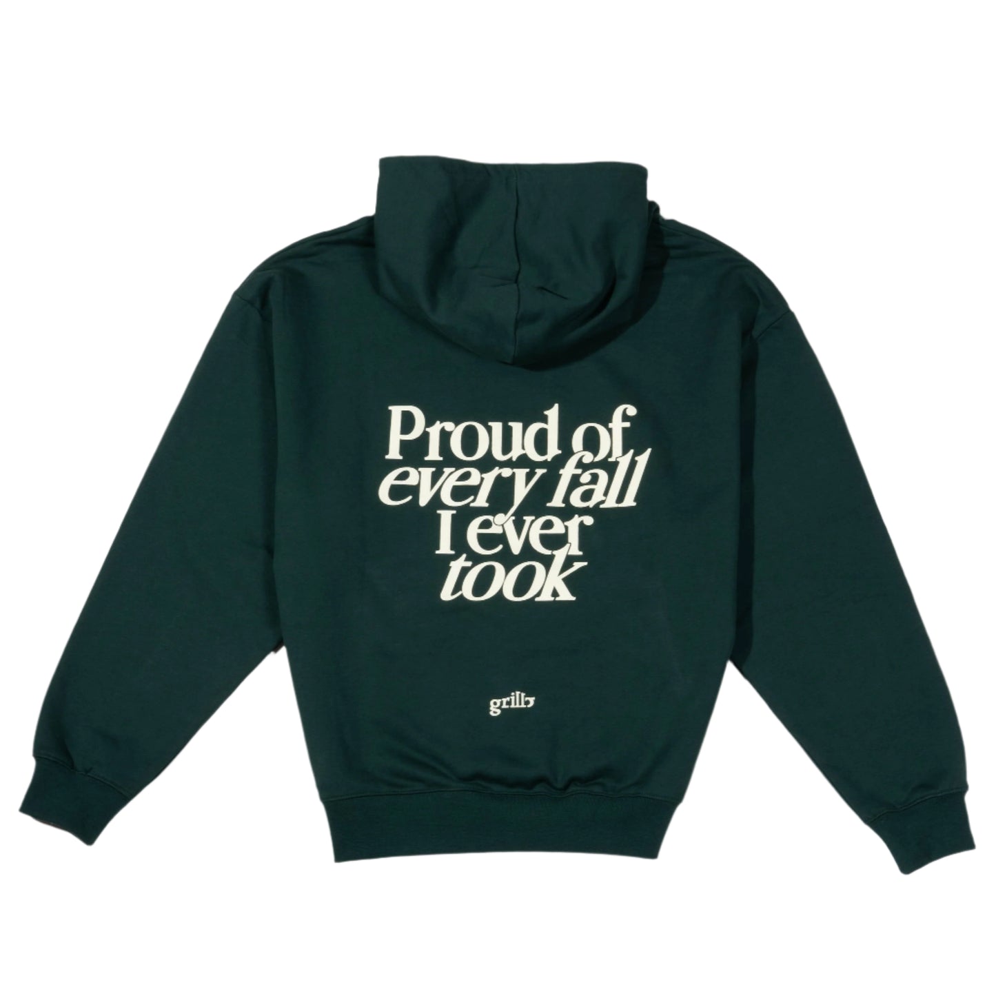 Parte trasera de la sudadera verde oscuro con capucha, 100% algodón. Frase 'proud of every fall i ever took' serigrafiada en color crema.