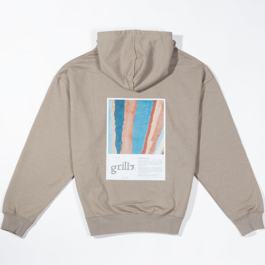 Parte trasera de la sudadera khaki con capucha, 100% algodón french terry. Diseño DTF de un famoso muro en el mundo de la escalada y texto descriptivo.